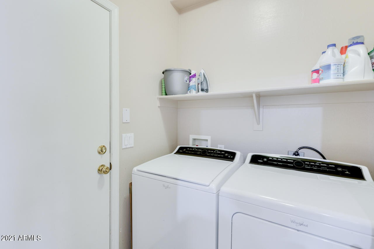 44 South Greenfield Road, Unit 48 Mesa, AZ 85206 - Photo 27 of 32 a utility room with dryer and washer