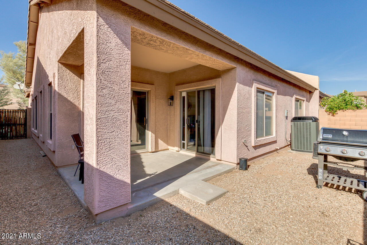 44 South Greenfield Road, Unit 48 Mesa, AZ 85206 - Photo 30 of 32 a view of a house with backyard and sitting area