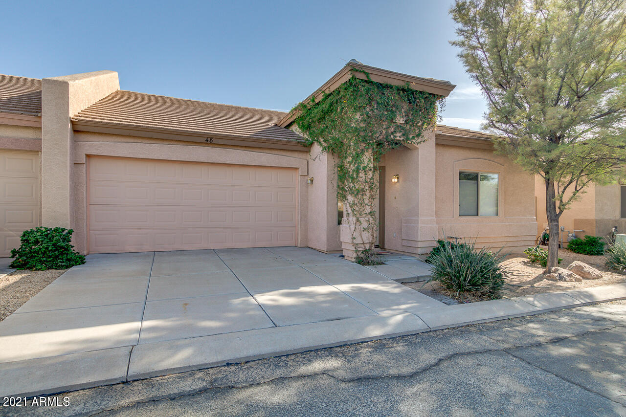 44 South Greenfield Road, Unit 48 Mesa, AZ 85206 - Photo 3 of 32 a view of a front of house with garage