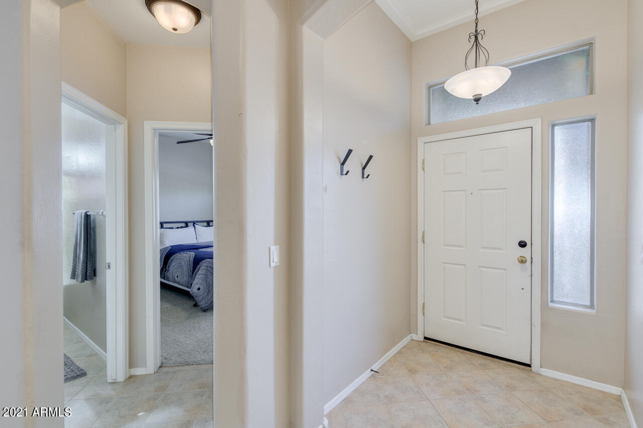 44 South Greenfield Road, Unit 48 Mesa, AZ 85206 - Photo 4 of 32 a view of a room with a wardrobe space