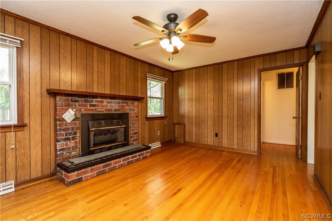 2885 Venter Road Aylett, VA 23009 - Photo 15 of 34 a view of an empty room with a fireplace and a window