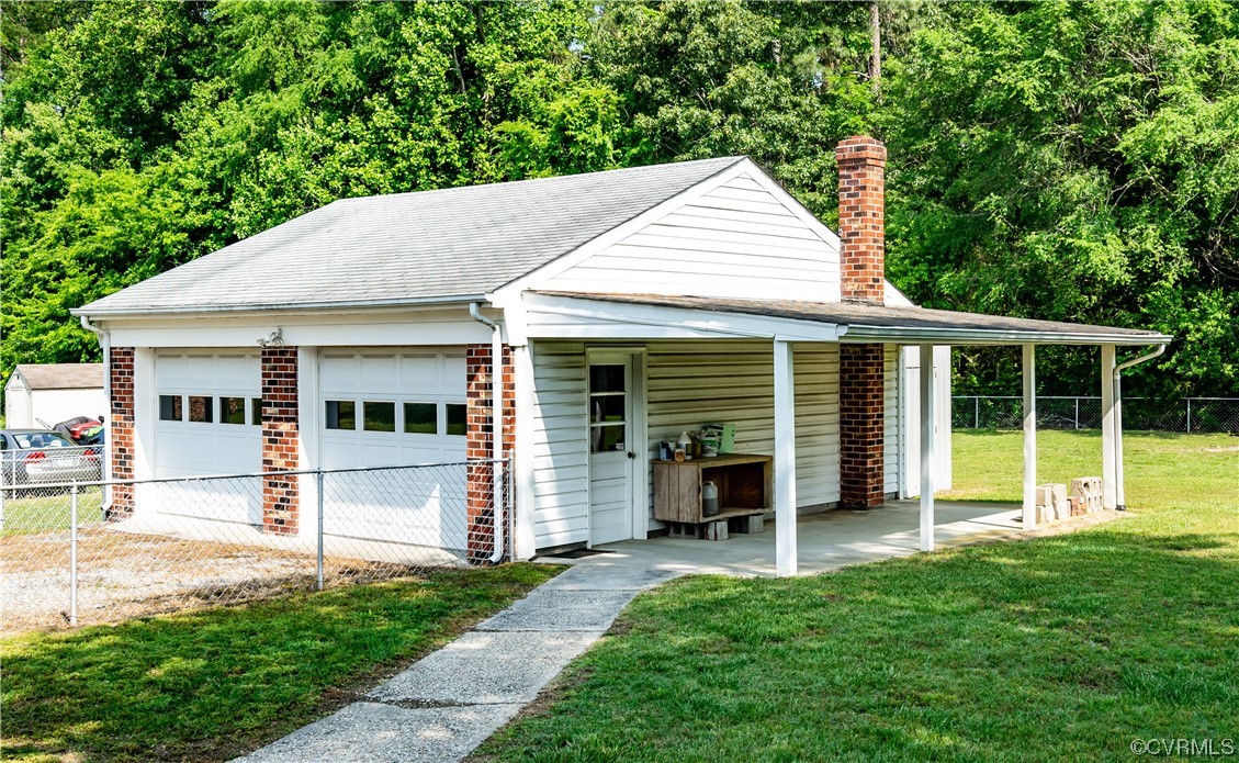 2885 Venter Road Aylett, VA 23009 - Photo 2 of 34 a view of a house with a yard and sitting area
