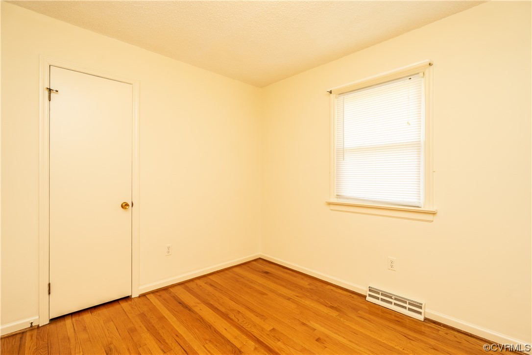 2885 Venter Road Aylett, VA 23009 - Photo 28 of 34 a view of a room with wooden floor and a window