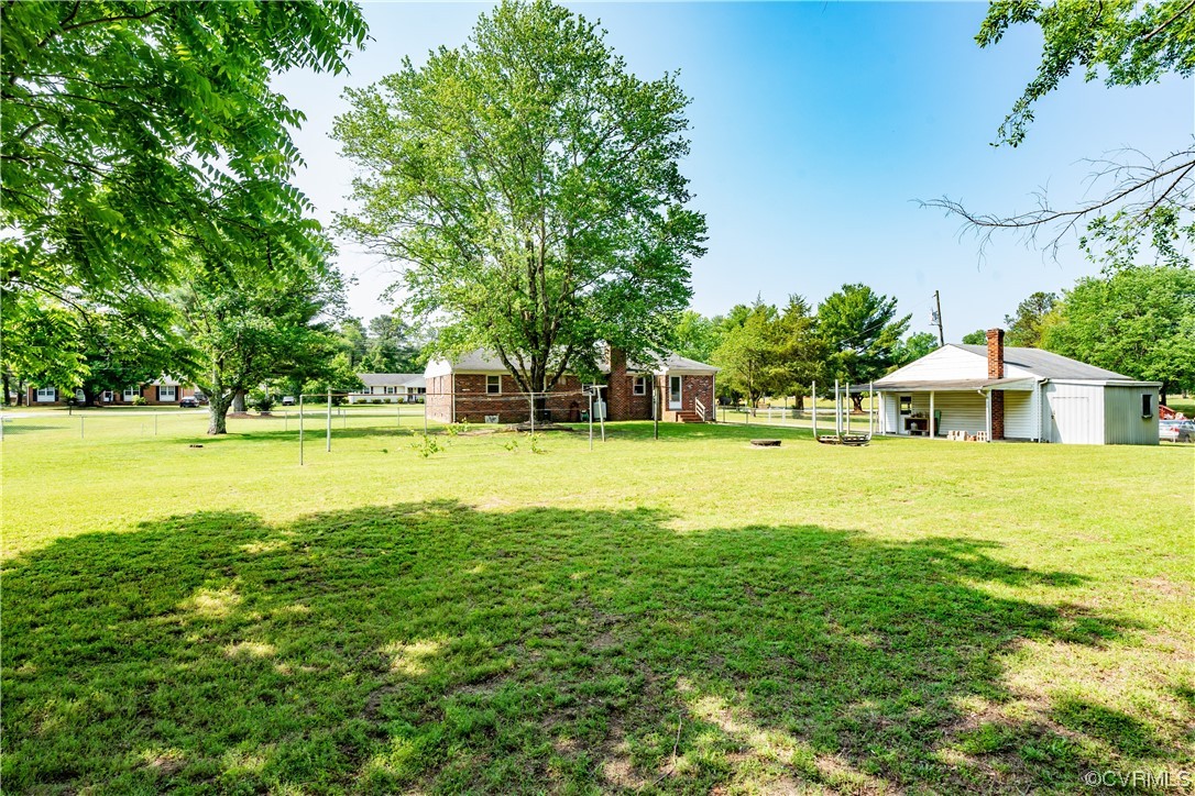 2885 Venter Road Aylett, VA 23009 - Photo 34 of 34 a view of a house with a big yard