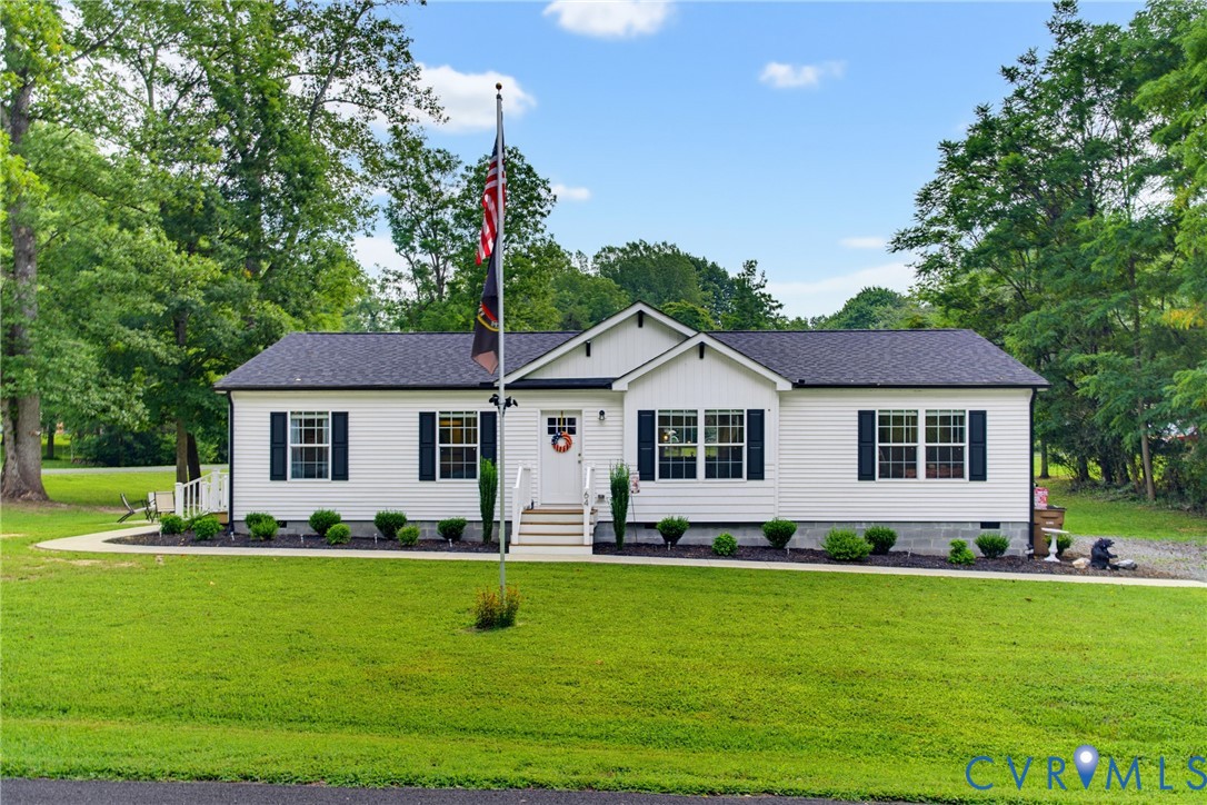 64 Pine Road Louisa, VA 23093 - Photo 2 of 53 White siding exterior with a dark shingle roof and