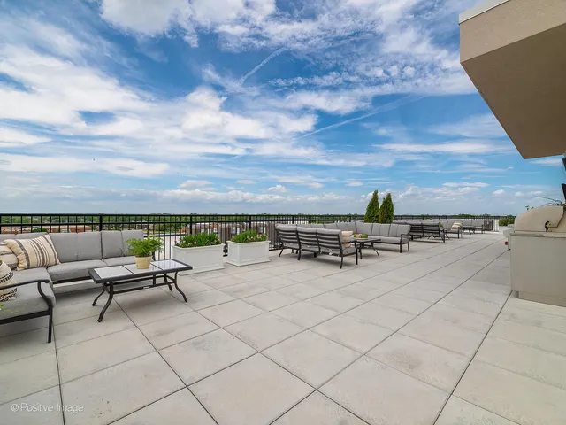 a view of a terrace with chairs