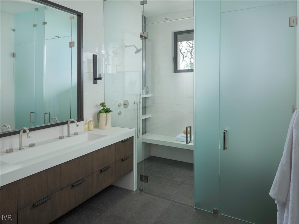 460 Gonowabie Road Crystal Bay, NV 89402 - Photo 29 of 36 a bathroom with a double vanity sink toilet mirror and bathtub