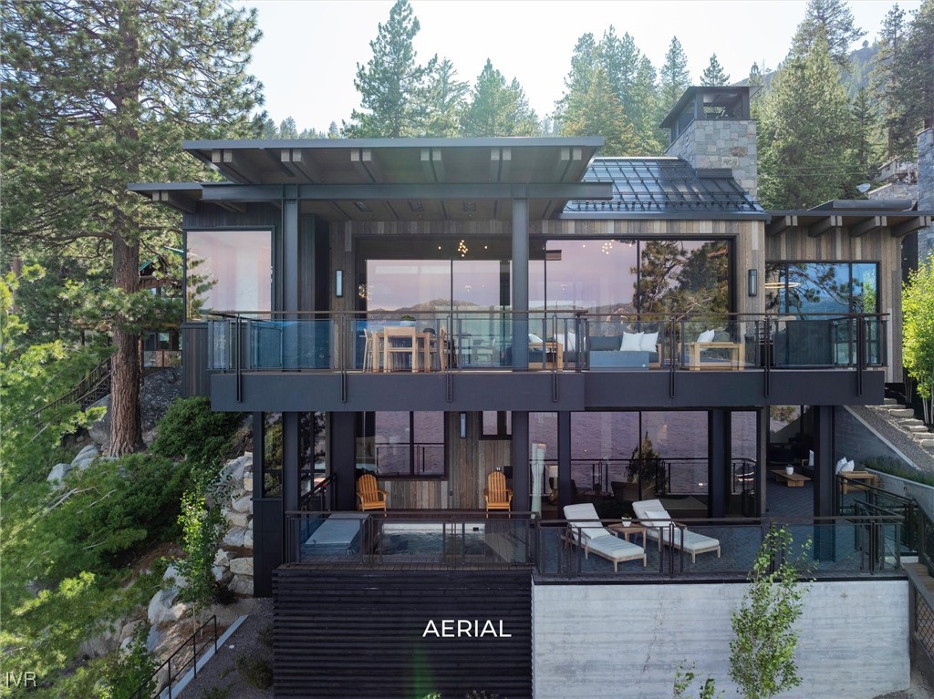 460 Gonowabie Road Crystal Bay, NV 89402 - Photo 32 of 36 a view of a house with sitting area and garden