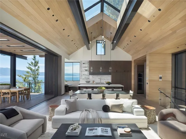 a kitchen that has a table and chairs in it