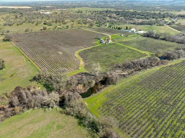 a view of a golf course with green space