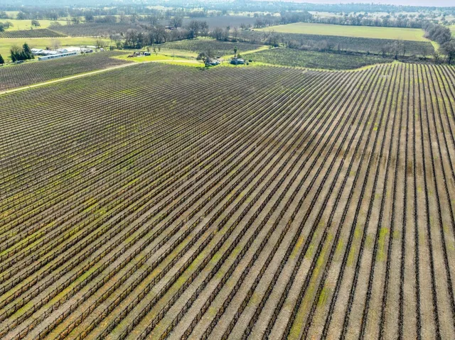 a view of a swimming pool with an outdoor space and seating area