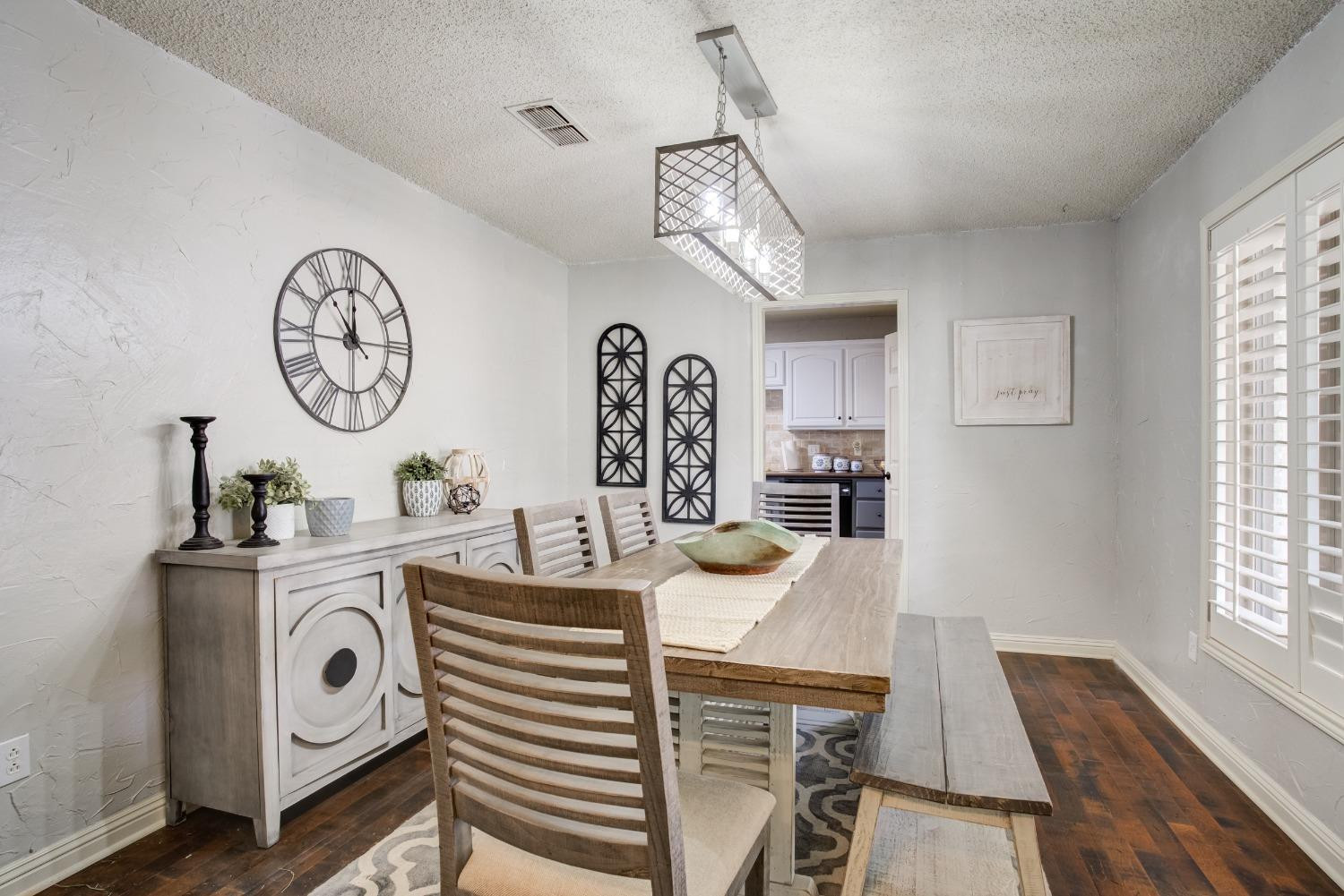 1428 5th Street Shallowater, TX 79363 - Photo 24 of 30 a view of a kitchen with dining table and chairs