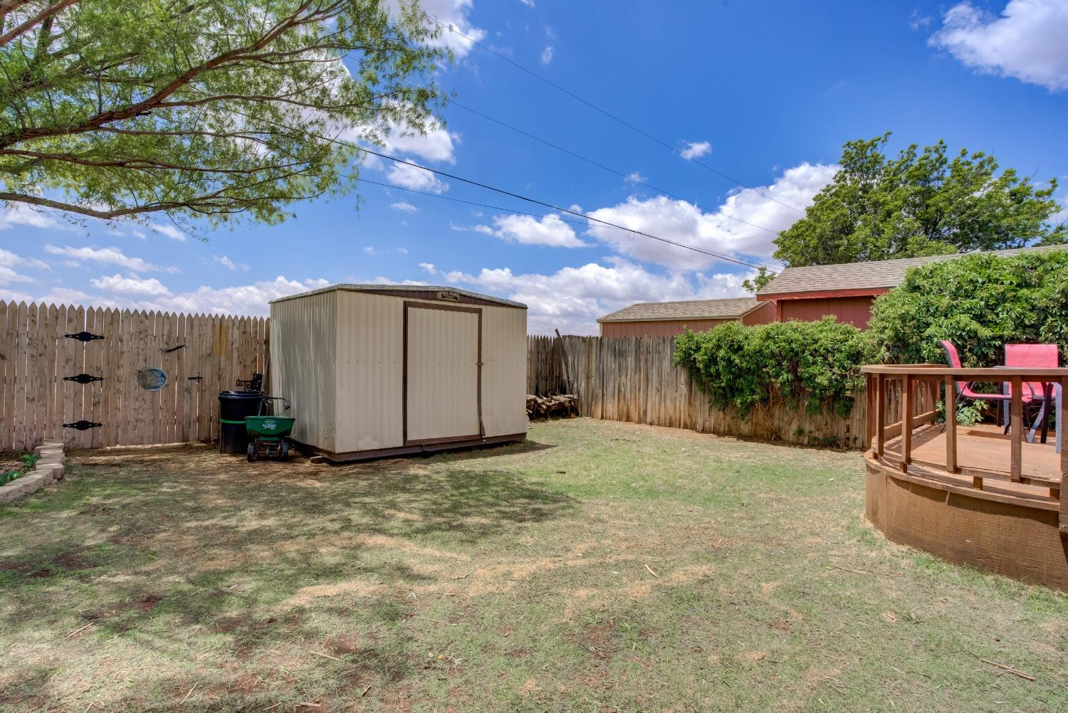 1428 5th Street Shallowater, TX 79363 - Photo 27 of 30 a backyard of a house with table and chairs