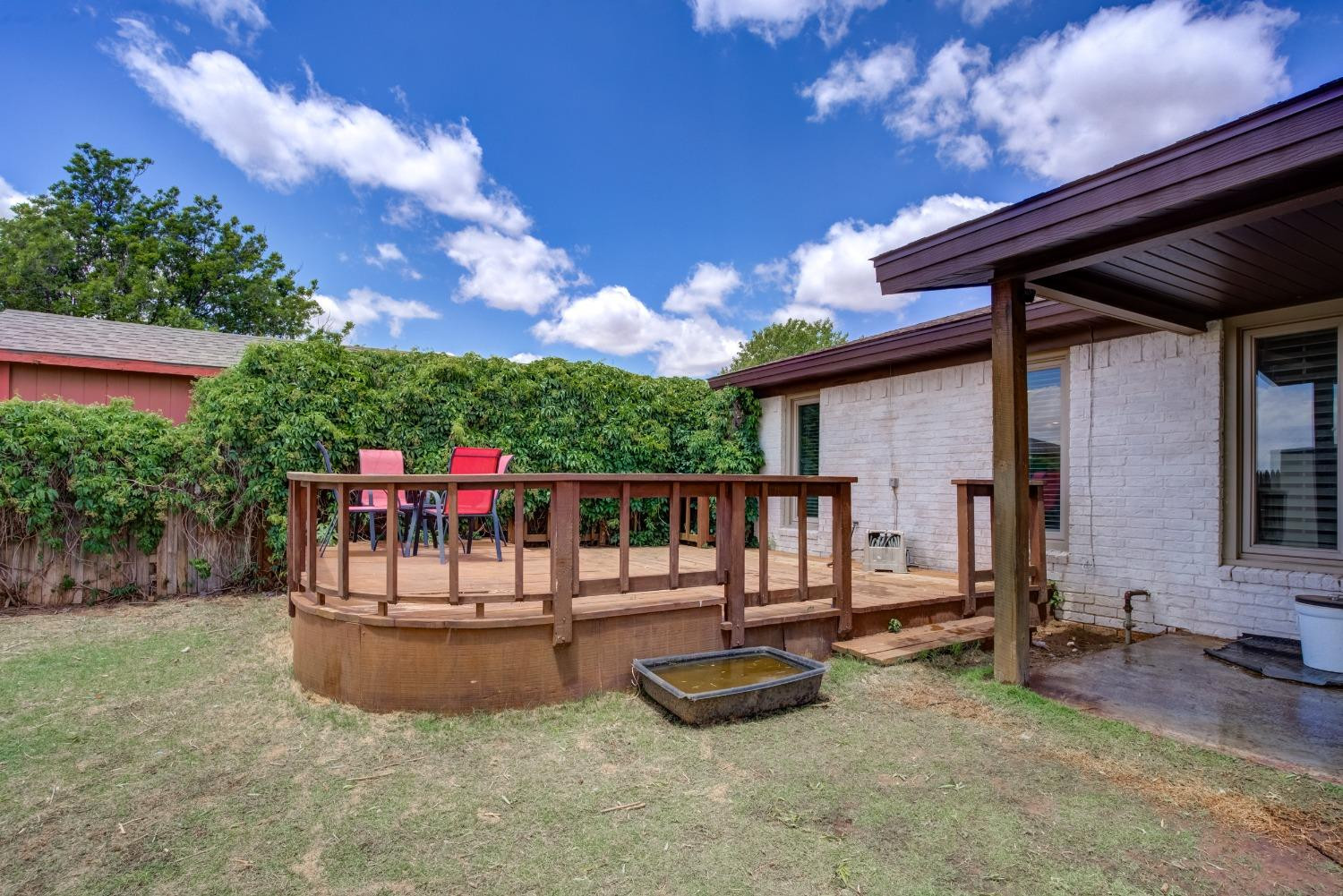 1428 5th Street Shallowater, TX 79363 - Photo 28 of 30 a view of a chairs and tables in the patio