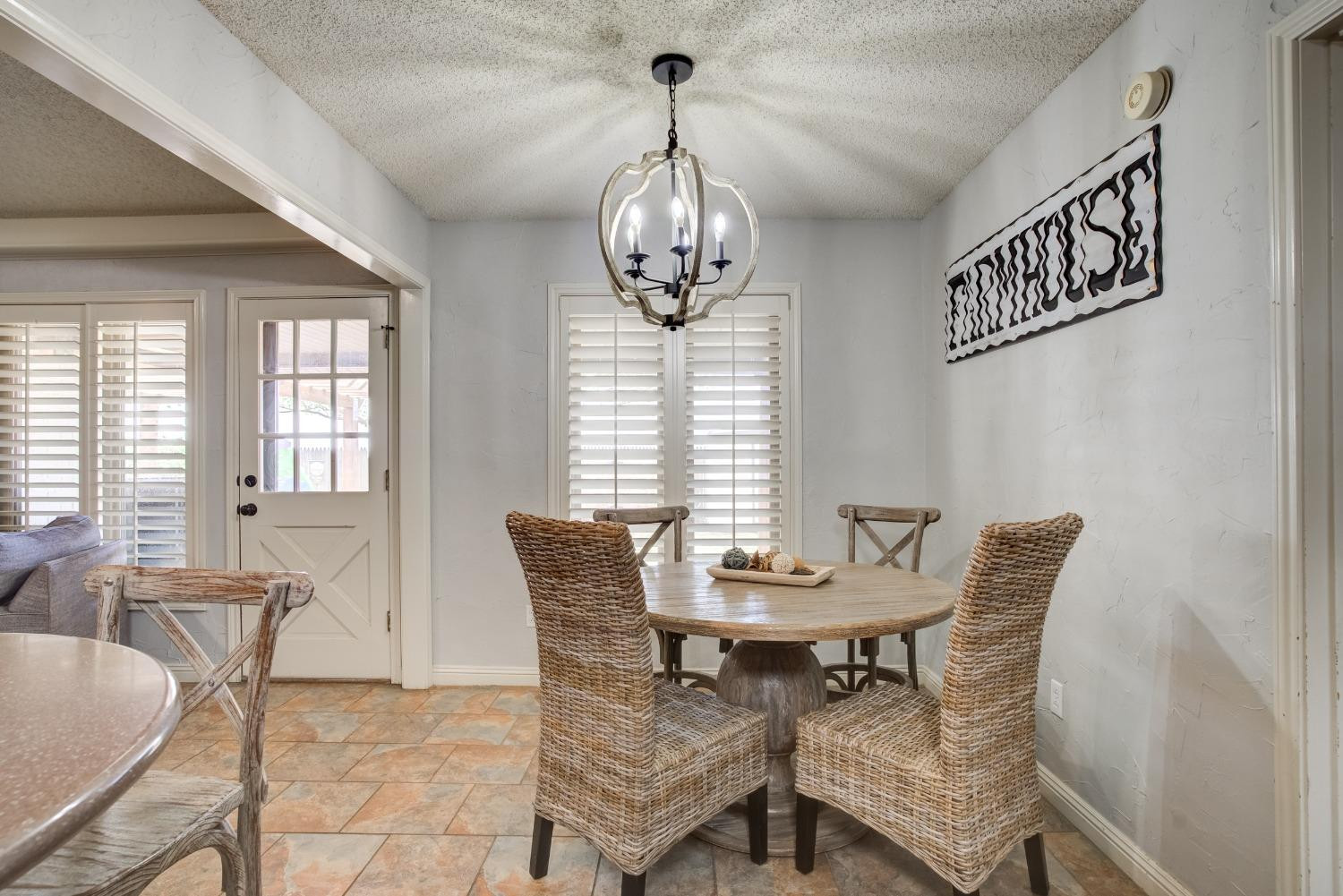 1428 5th Street Shallowater, TX 79363 - Photo 10 of 30 a view of a dining room with furniture window and outside view