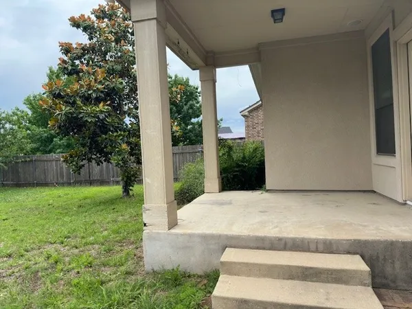 a house view with garden space