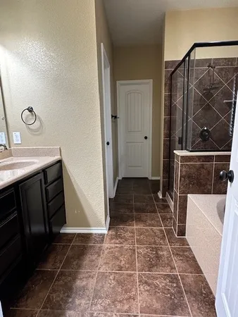 an empty room with a empty space and windows