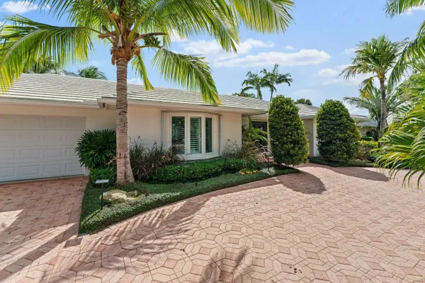 a view of a backyard of a house