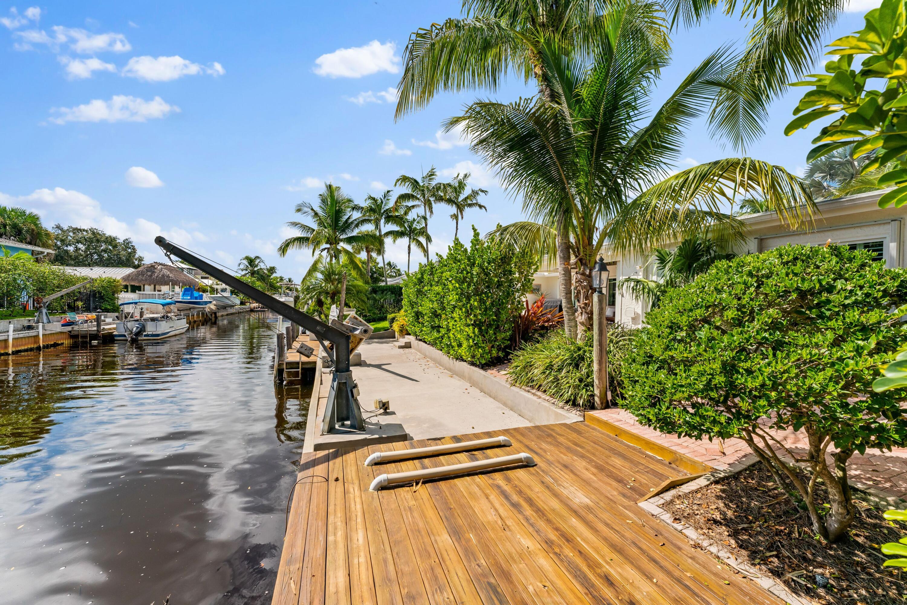 18150 Perigon Way Jupiter, FL 33458 - Photo 40 of 57 a view of swimming pool with a yard and seating area