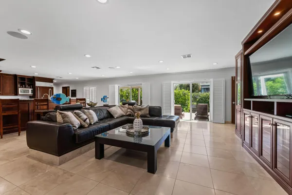 a living room with furniture and a table