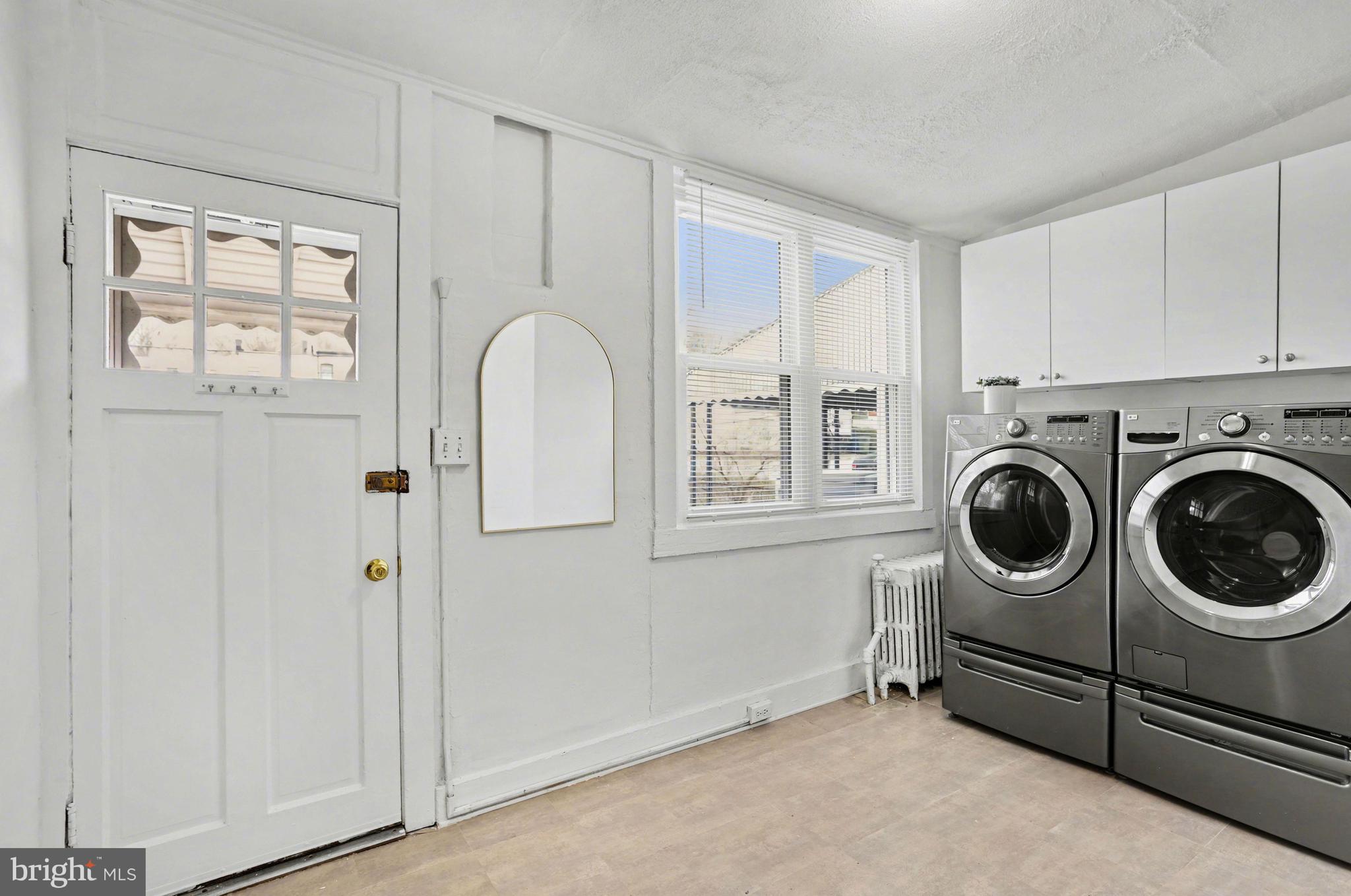 3616 Keystone Avenue Baltimore, MD 21211 - Photo 20 of 26 a utility room with dryer and washer