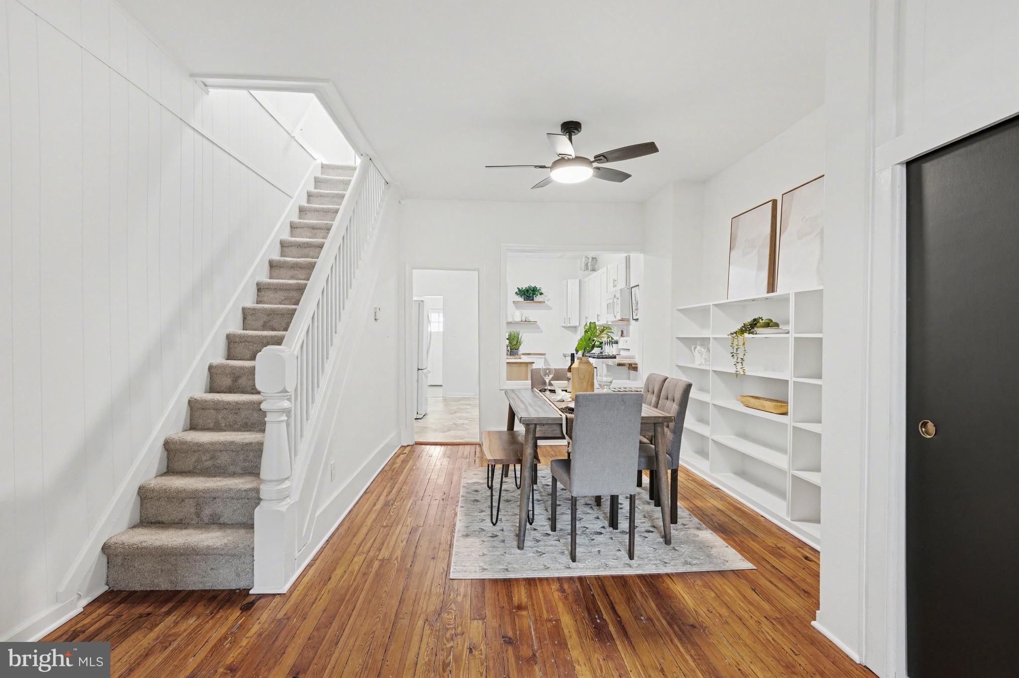 3616 Keystone Avenue Baltimore, MD 21211 - Photo 8 of 26 a view of a dining room with furniture and wooden floor