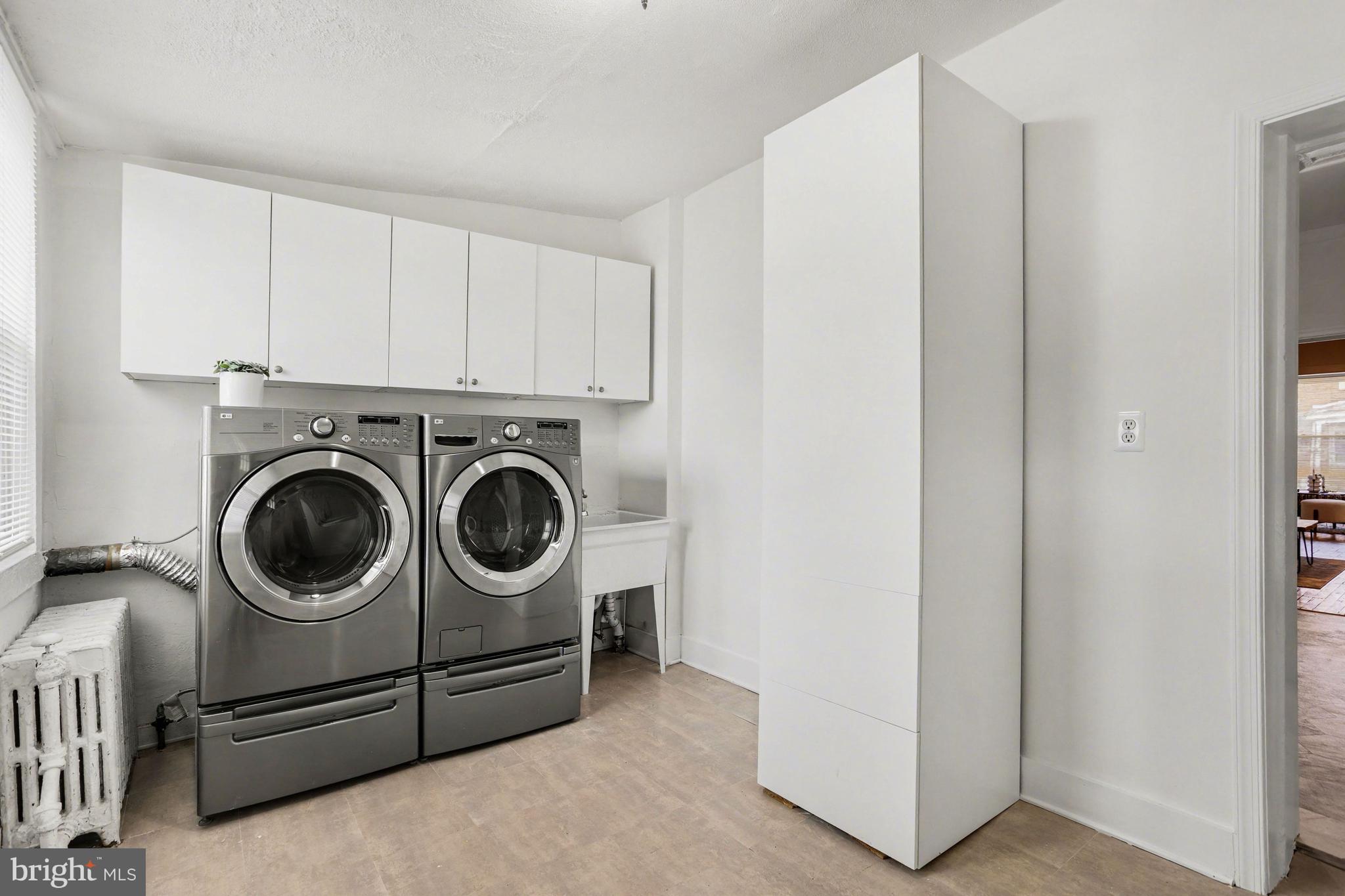 3616 Keystone Avenue Baltimore, MD 21211 - Photo 10 of 26 a utility room with dryer and washer
