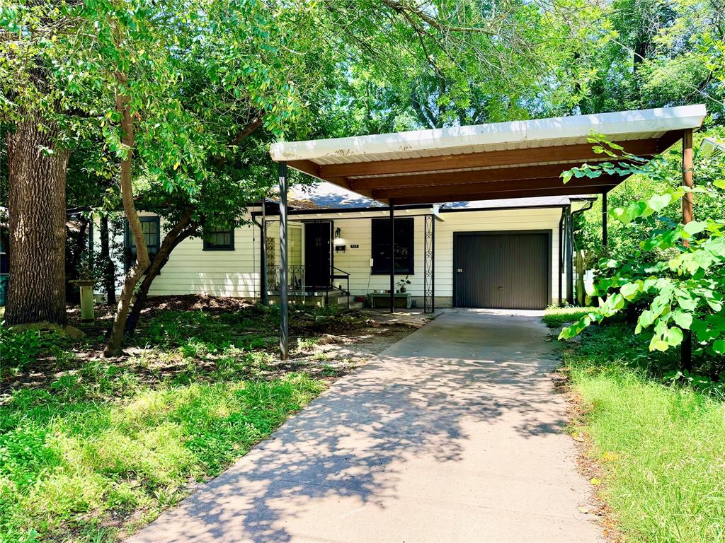 919 Denton Street Denton, TX 76201 - Photo 1 of 19 a view of outdoor space yard and deck