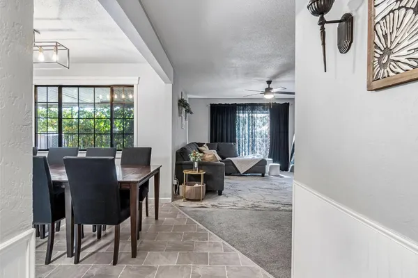 a view of a livingroom with furniture and window