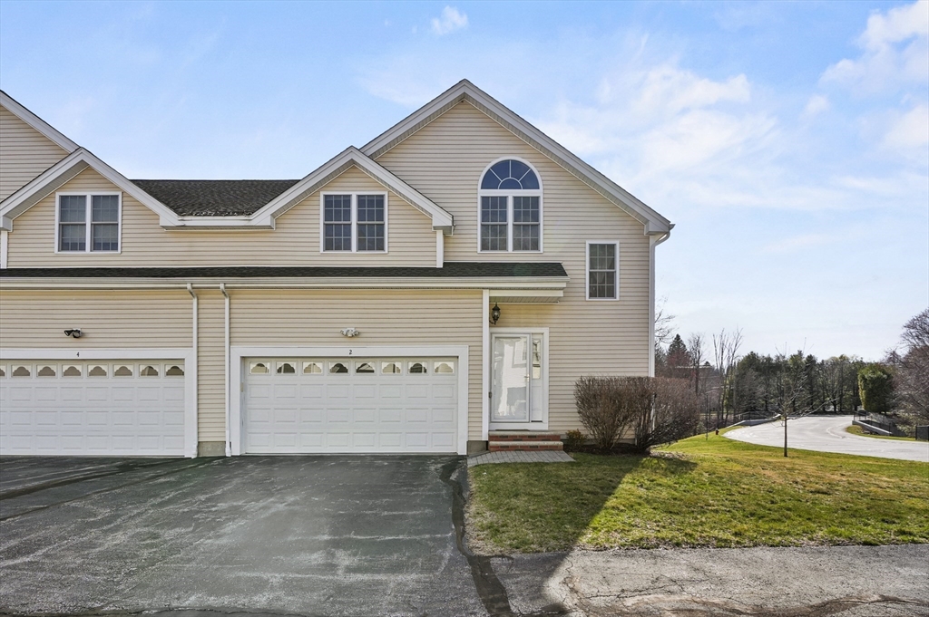 2 Jasmine Drive, Unit 2 West Boylston, MA 01583 - Photo 1 of 42 a view of a house with backyard