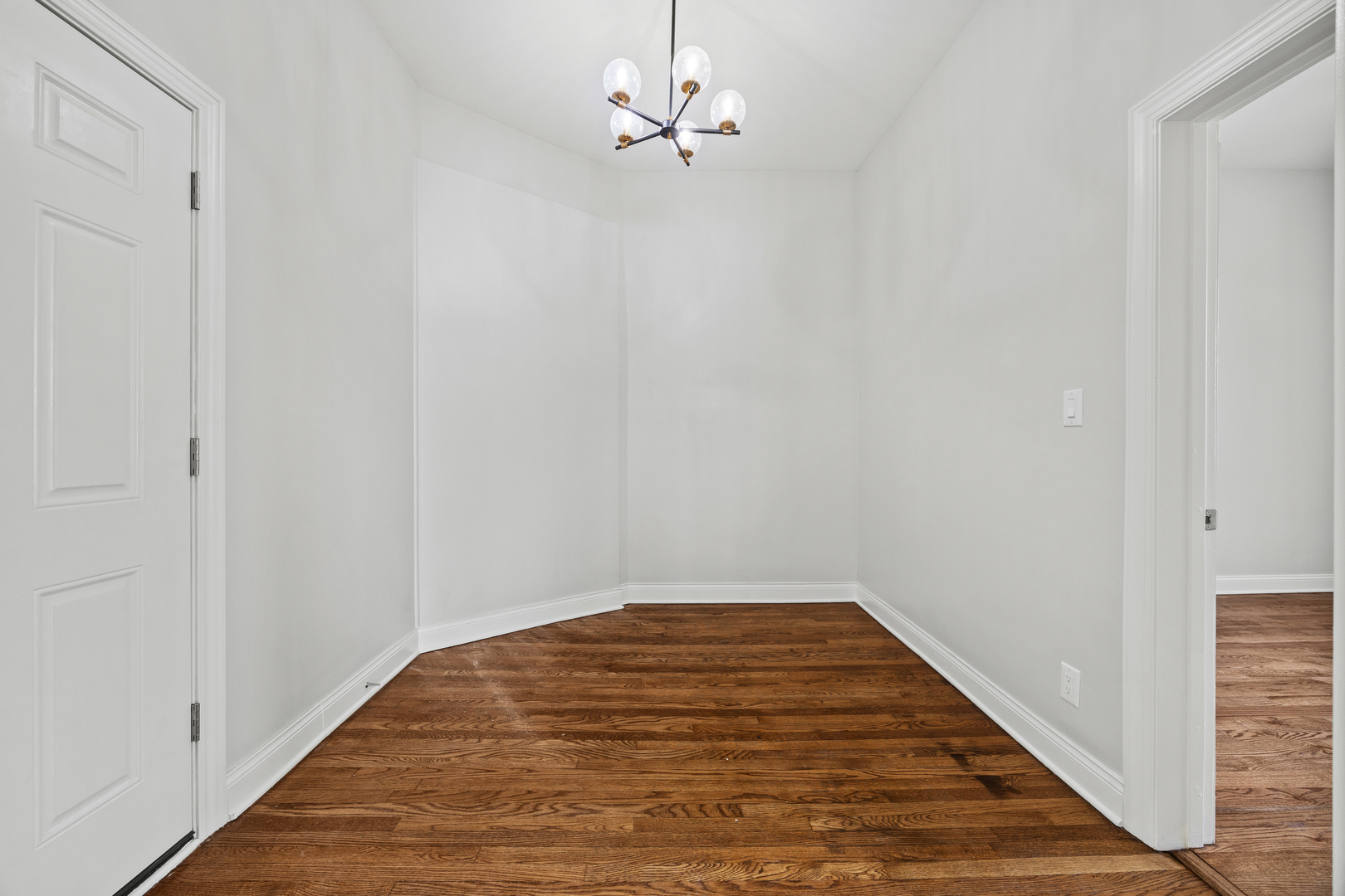 3214 West Division Street, Unit 2 Chicago, IL 60651 - Photo 7 of 14 a view of a room with a ceiling fan