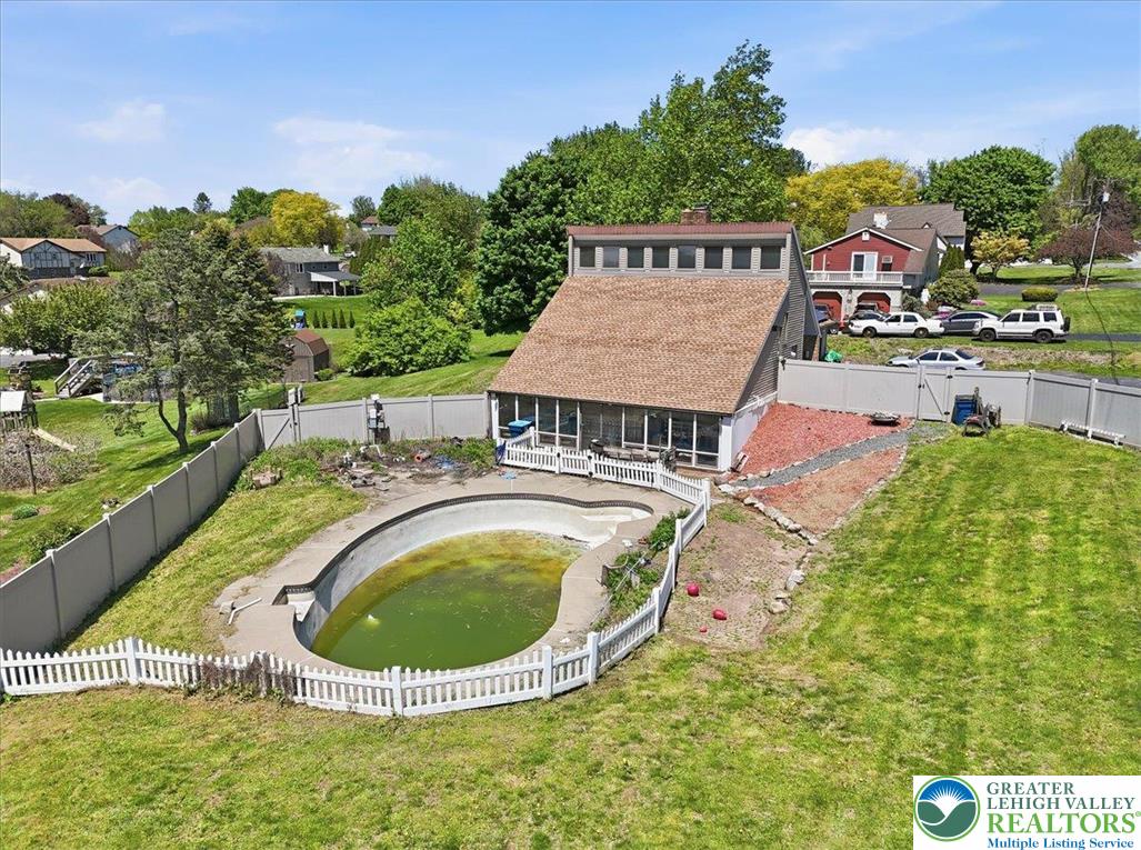 7567 Airport Road Bath, PA 18014 - Photo 12 of 67 an aerial view of a house with swimming pool garden and mountain view