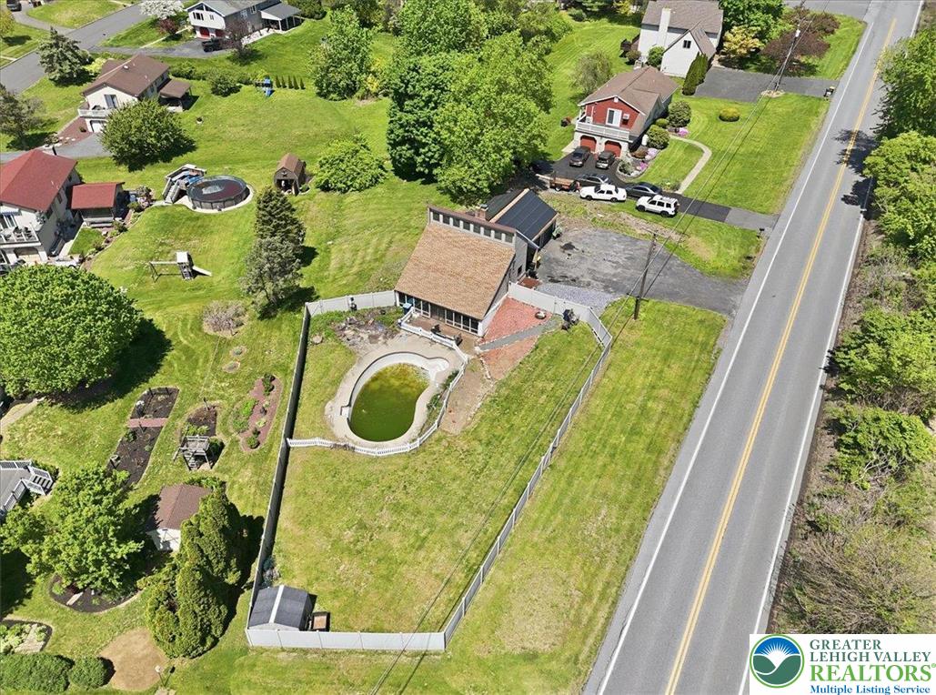 7567 Airport Road Bath, PA 18014 - Photo 13 of 67 an aerial view of a house with swimming pool
