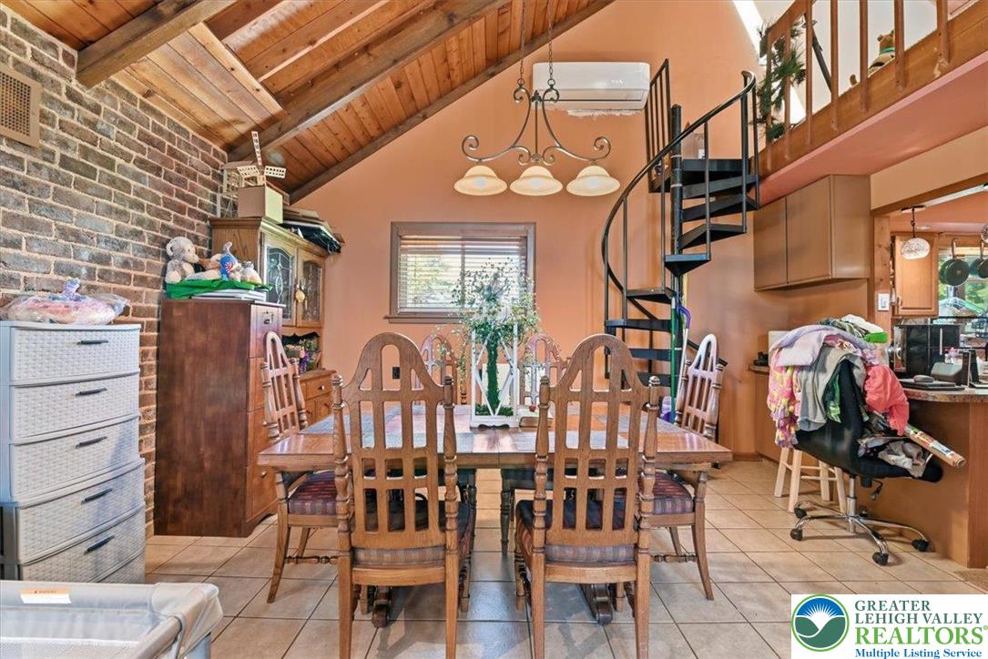 7567 Airport Road Bath, PA 18014 - Photo 19 of 67 a view of a chairs and table in the patio