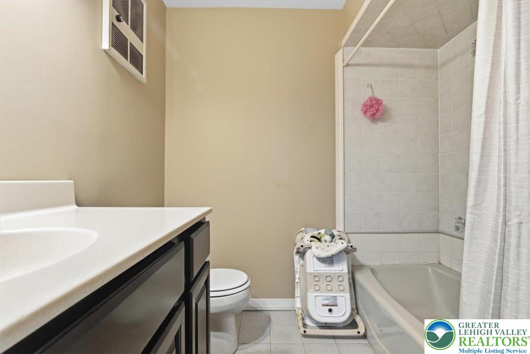 7567 Airport Road Bath, PA 18014 - Photo 49 of 67 a bathroom with a sink a toilet and a bathtub