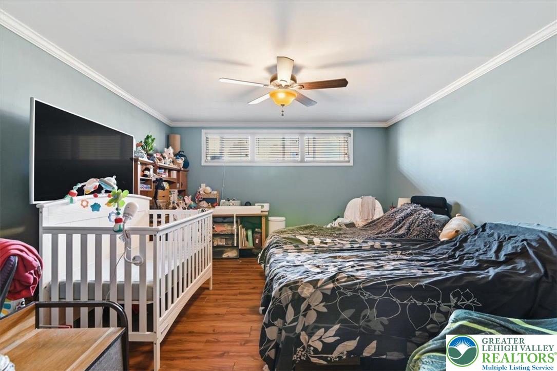 7567 Airport Road Bath, PA 18014 - Photo 52 of 67 a bedroom with furniture and a window