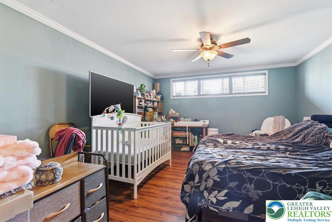 7567 Airport Road Bath, PA 18014 - Photo 53 of 67 a bedroom with furniture and a window