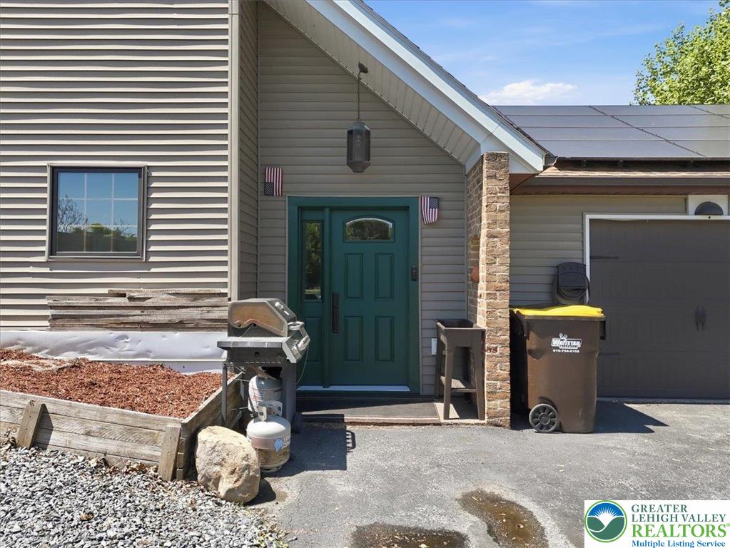 7567 Airport Road Bath, PA 18014 - Photo 6 of 67 a front view of a house with patio