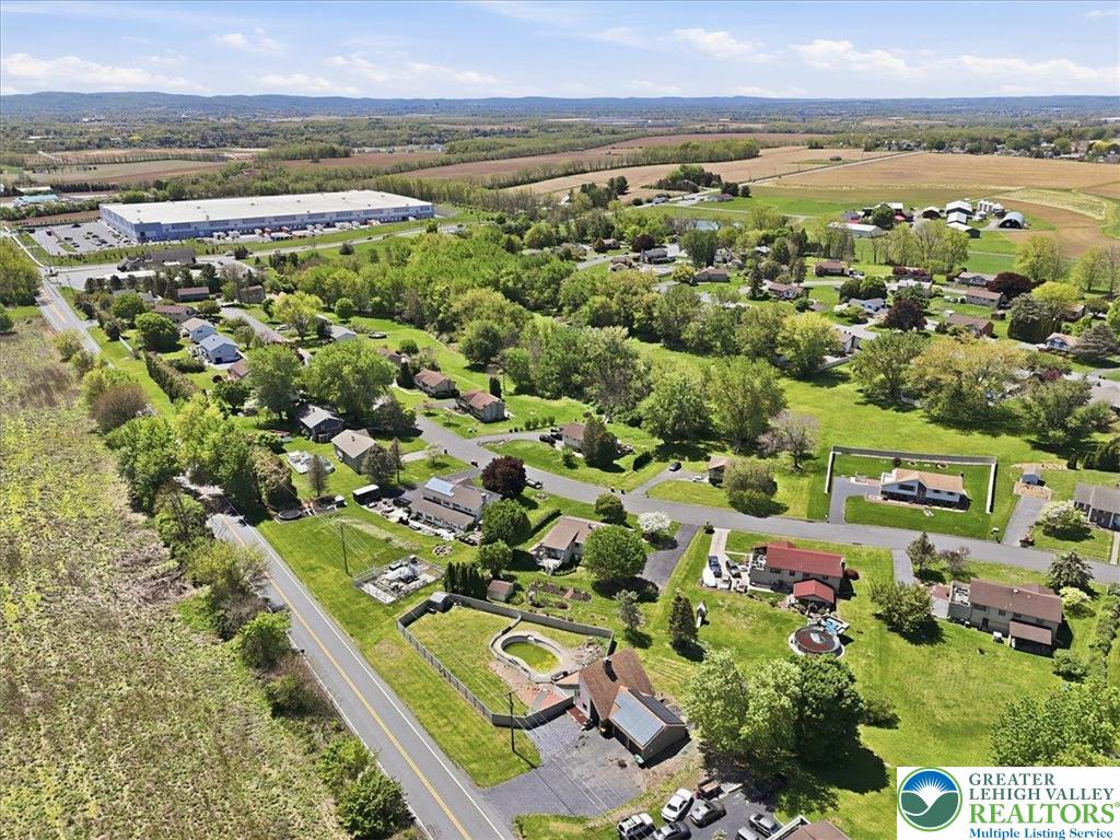 7567 Airport Road Bath, PA 18014 - Photo 62 of 67 an aerial view of residential houses with outdoor space