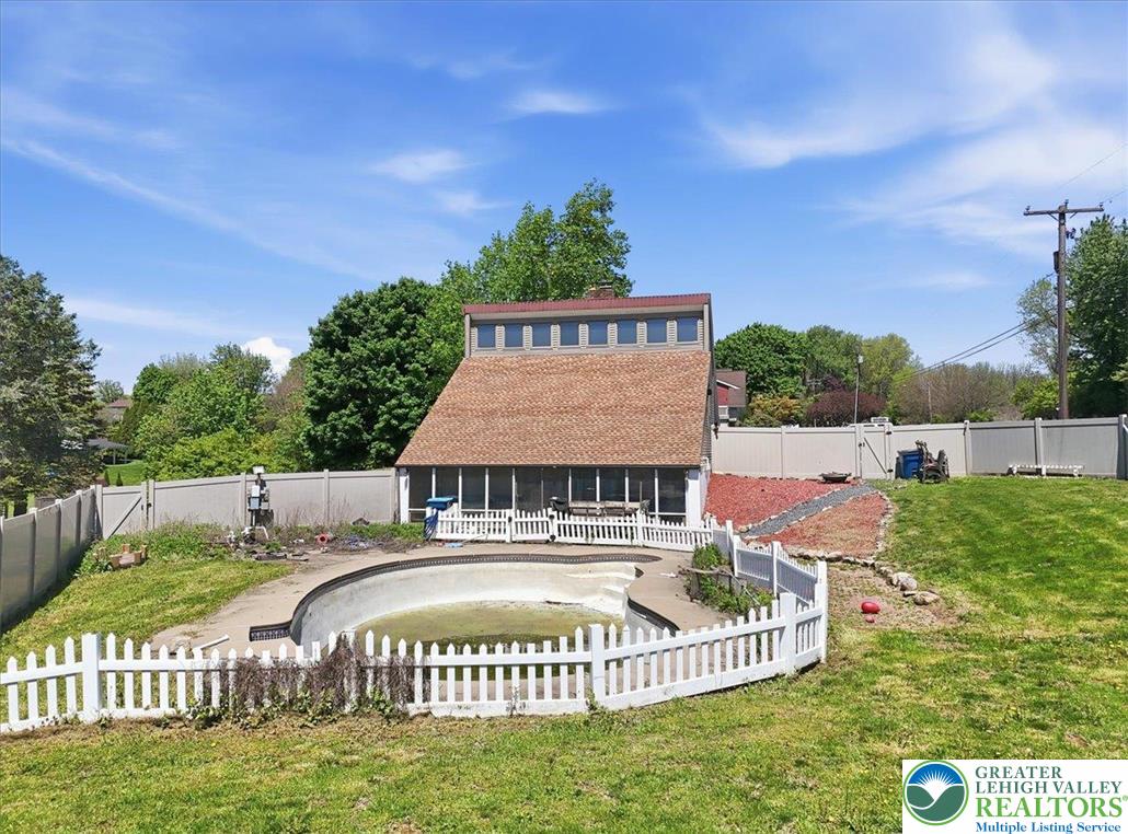 7567 Airport Road Bath, PA 18014 - Photo 9 of 67 a view of a house with a swimming pool and a yard