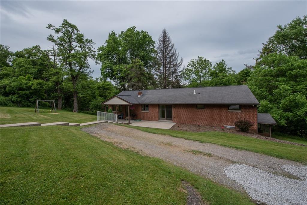 365 Boston Hollow Road Elizabeth, PA 15037 - Photo 2 of 25 Brick home surrounded by acres of trees and entertaining areas!