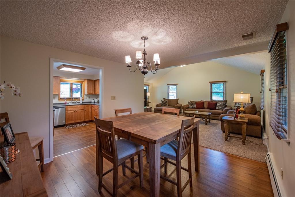 365 Boston Hollow Road Elizabeth, PA 15037 - Photo 8 of 25 Formal Dining Room Measures 12x11 in the Center of the Living Room and Kitchen.