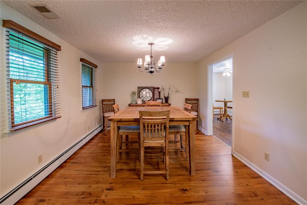 365 Boston Hollow Road Elizabeth, PA 15037 - Photo 9 of 25 Look at those floors and wooden blinds.