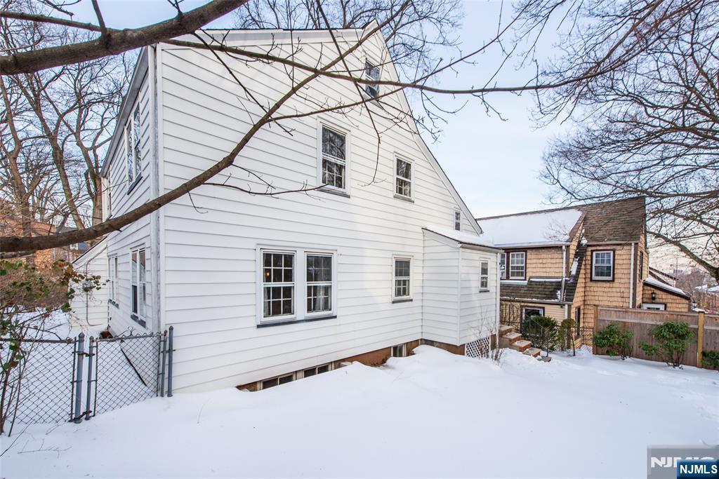 132 Mitchell Street West Orange, NJ 07052 - Photo 21 of 21 a view of a white house with a yard