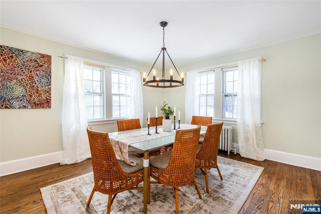 132 Mitchell Street West Orange, NJ 07052 - Photo 4 of 21 a dining room with furniture window wooden floor