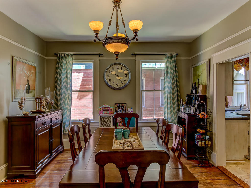 2230 Post Street Jacksonville, FL 32204 - Photo 16 of 34 a view of a dining room with furniture and chandelier