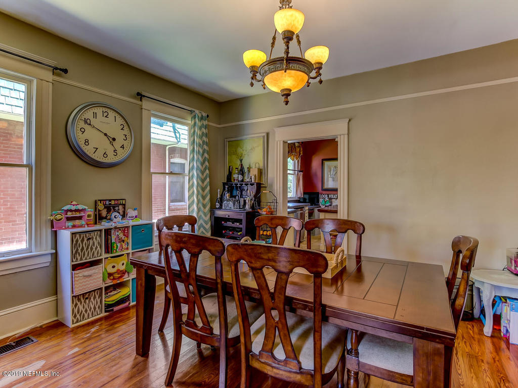 2230 Post Street Jacksonville, FL 32204 - Photo 17 of 34 a view of a dining room with furniture and wooden floor