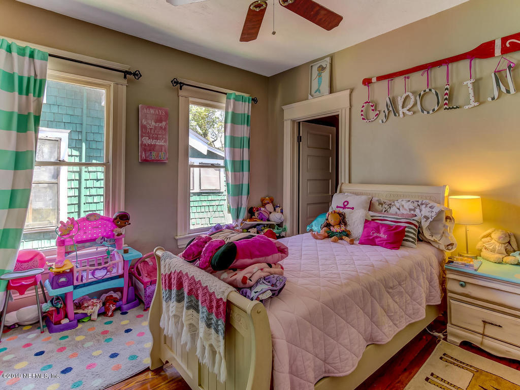 2230 Post Street Jacksonville, FL 32204 - Photo 29 of 34 a bedroom with a bed and a window