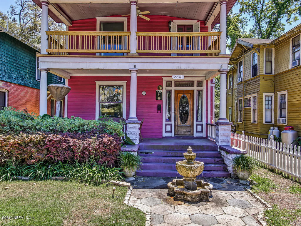 2230 Post Street Jacksonville, FL 32204 - Photo 34 of 34 a front view of a multi story residential apartment building with yard and outdoor seating