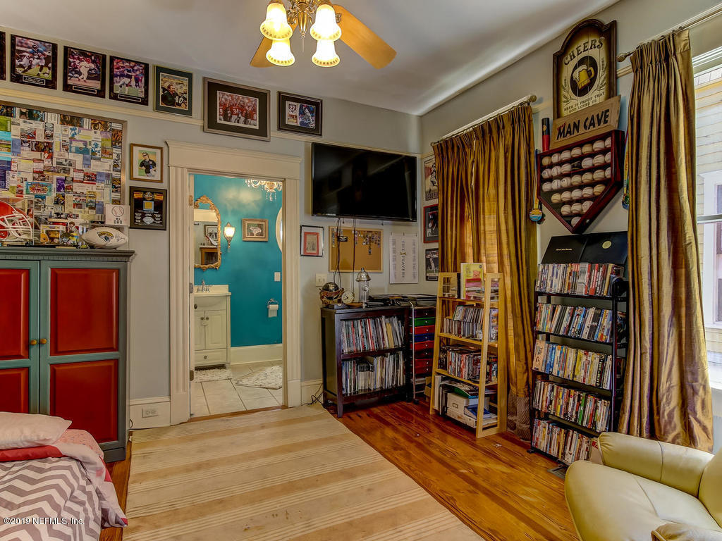 2230 Post Street Jacksonville, FL 32204 - Photo 9 of 34 a living room with furniture and a flat screen tv